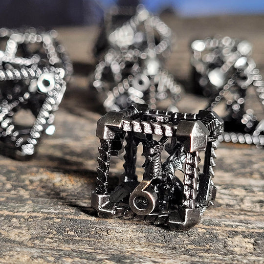 Dragon's Immure Antique Silver Hollow Metal RPG Dice Set Dice Forged Dice Co Dragon's Immure Antique Silver Hollow Metal RPG Dice Set