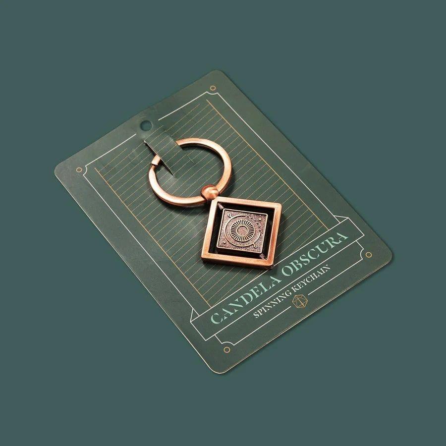 CR Candela Obscura Keychain Clothing & Accessories Darrington Press