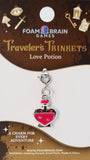 Traveler's Trinkets Charms Group 1 (19 options) Clothing & Accessories Foam Brain Games Love Potion  